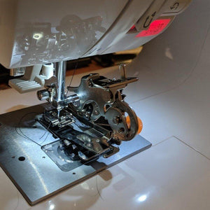 THE RUFFLER SEWING FOOT